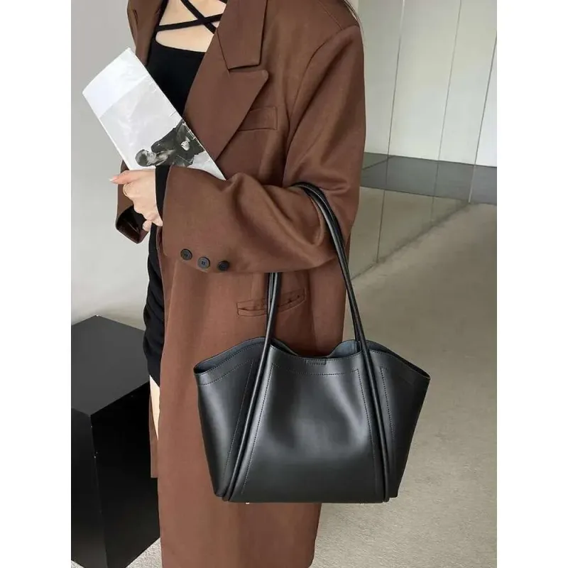 Nuovo stile nel 2025. Borsa a tracolla da donna in morbida pelle di nicchia. Ha una grande capacità, emana un tocco di lusso ed è adatta per_voghion.com