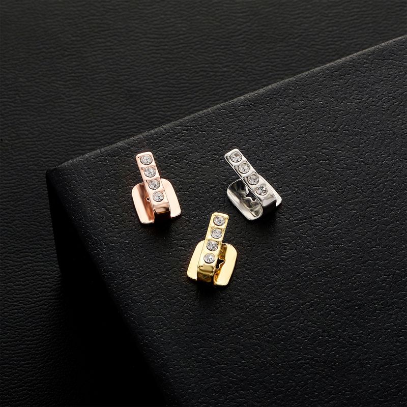 Apparecchio dentale a doppia combinazione con barra verticale singola scavata per l'uso quotidiano in strada, denti in oro intarsiati con diamanti e_voghion.com