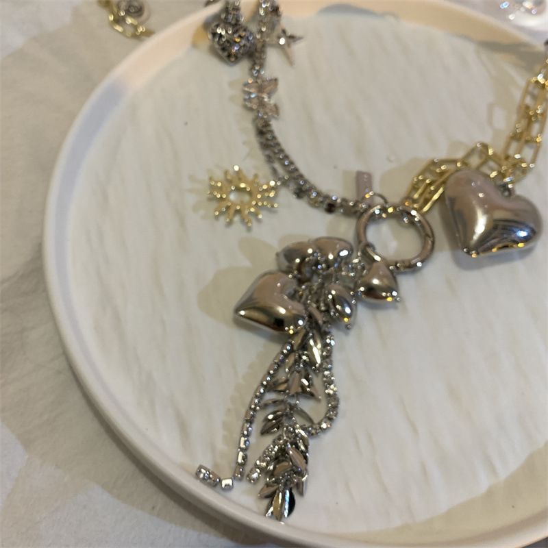 Ceinture polyvalente en métal avec pendentif en forme de cœur et plusieurs éléments pour femme_voghion.com