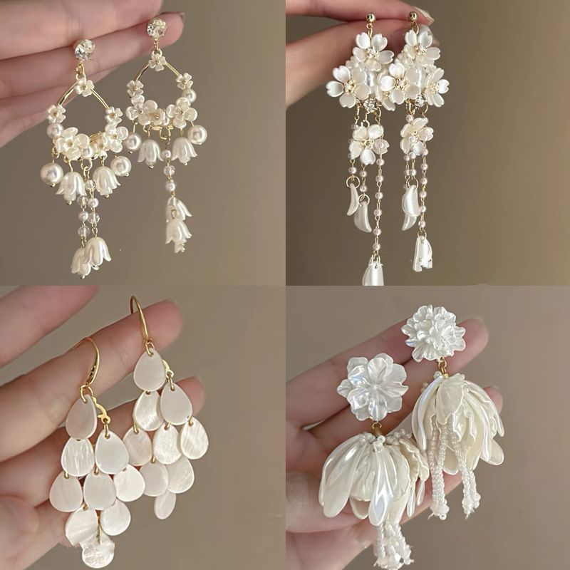 Orecchini pendenti in argento con fiocco elegante ultra immortale, fiore, luce francese, lusso, moda, stile letterario, dolci e versatili_voghion.com