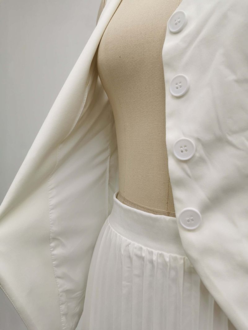 Vêtements pour femmes Costumes pour femmes Gilet sans manches d'été Fente Couleur unie Grande jupe plissée à volants Vêtements pour femmes Deux pièces Été_voghion.com