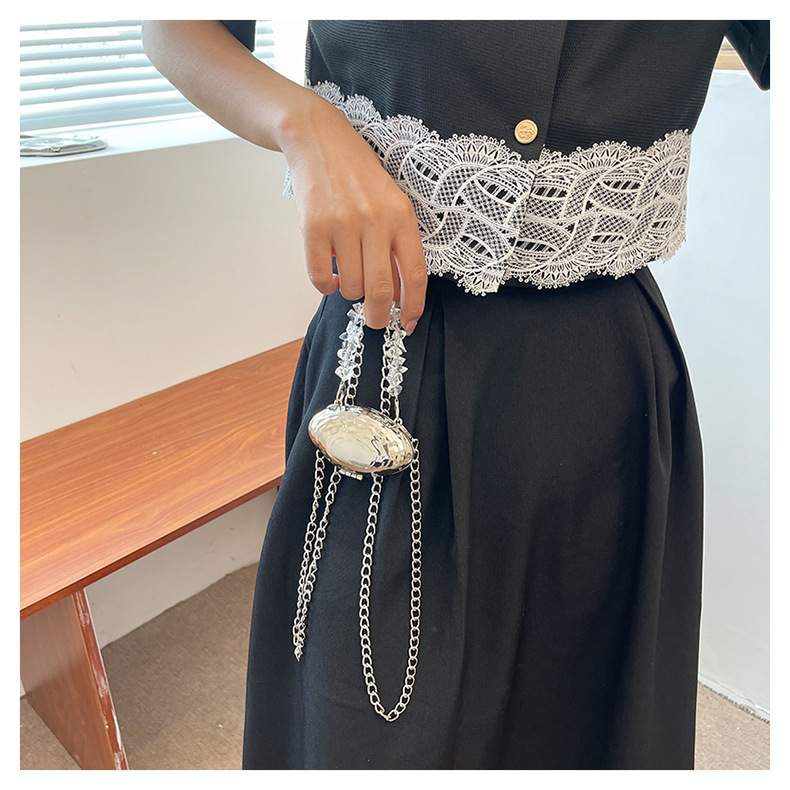 Mini 2024 Été Nouveau sac en coquille d'œuf en métal Sac de banquet de mode européenne et américaine Sac à bandoulière à bandoulière unique Sac pour femmes élégant_voghion.com