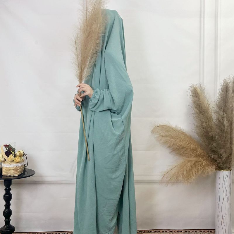 Sieviešu apģērbs Tuvajos Austrumos Dubaijā, malajiešu vienkrāsains, brīvs halāts, plus izmēra sieviešu kleita_voghion.com