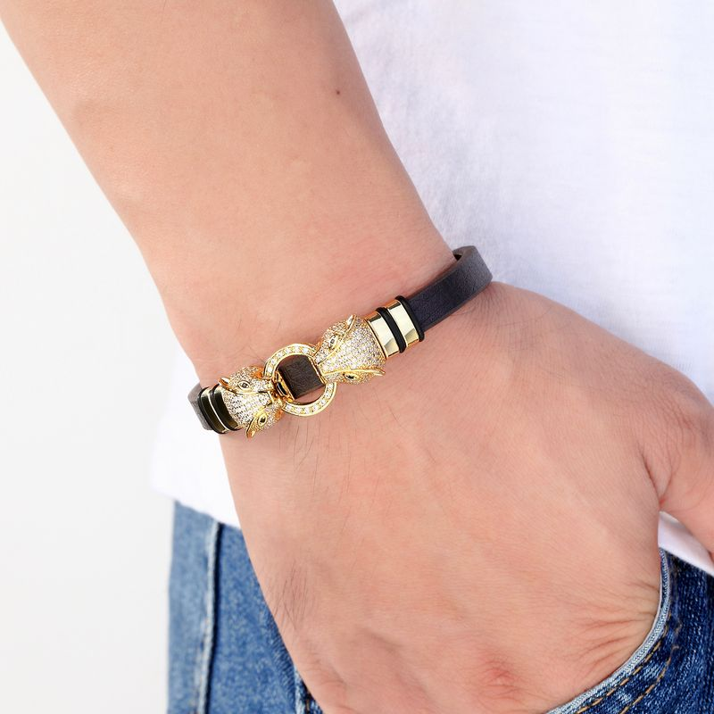 Modisches Armband aus braunem Lederseil mit Mikrobesatz aus Zirkonia_voghion.com