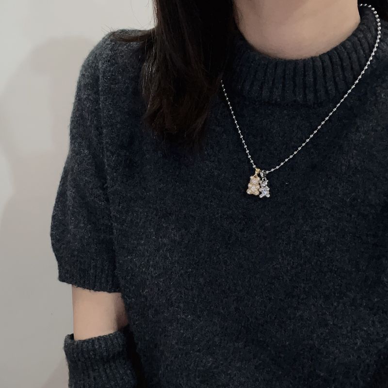 Collana con ciondolo a forma di orso con zircone intarsiato micro in titanio, design di nicchia, moda, collana versatile, catena per maglione_voghion.com