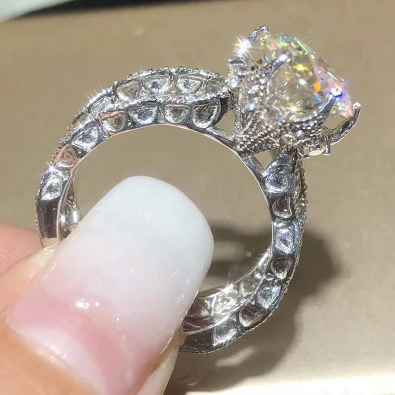 Cao Shi Hollow Flower Classic Women's Set with Zircon Wedding Scene Ring_voghion.com