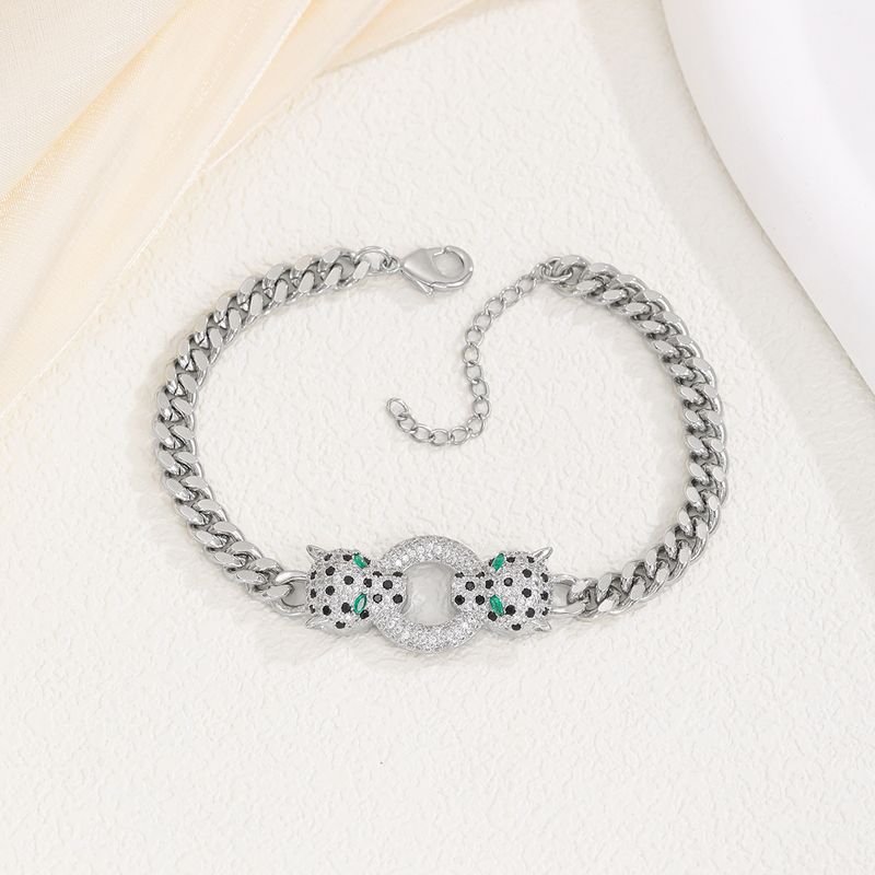 Bracciale da uomo e da donna in rame micro pavé di zirconi, placcato oro vero, stile punk hip hop, con doppia testa di leopardo_voghion.com