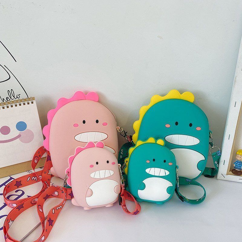 Portamonete per bambini dei cartoni animati 2022 Nuovo dinosauro in silicone per bambine piccole Borsa a tracolla carina, brutta e adorabile, alla moda_voghion.com