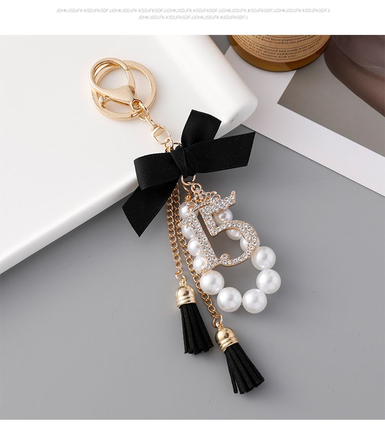 Korejiešu versija izsmalcināta radoša pērļu virtene ar 15 lociņu pušķu atslēgu piekariņu moderna rokām darināta soma kulons dāvana_voghion.com