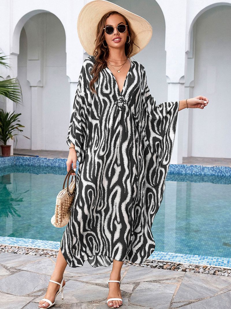 „Strandkleid mit Bohemian-Print – Fließendes langes Kleid für Pool und Urlaub“_voghion.com
