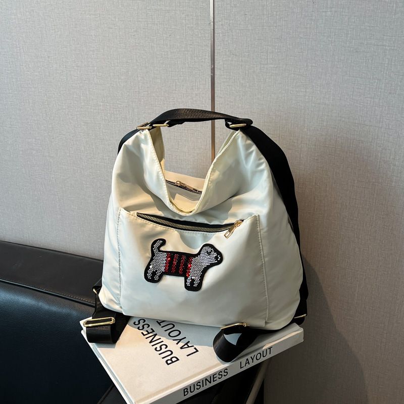Borsa a tracolla multiuso in stile coreano INS per ragazze, 2025, nuova borsa a tracolla con cucciolo di cartone animato, grande capacità, zaino versatile_voghion.com