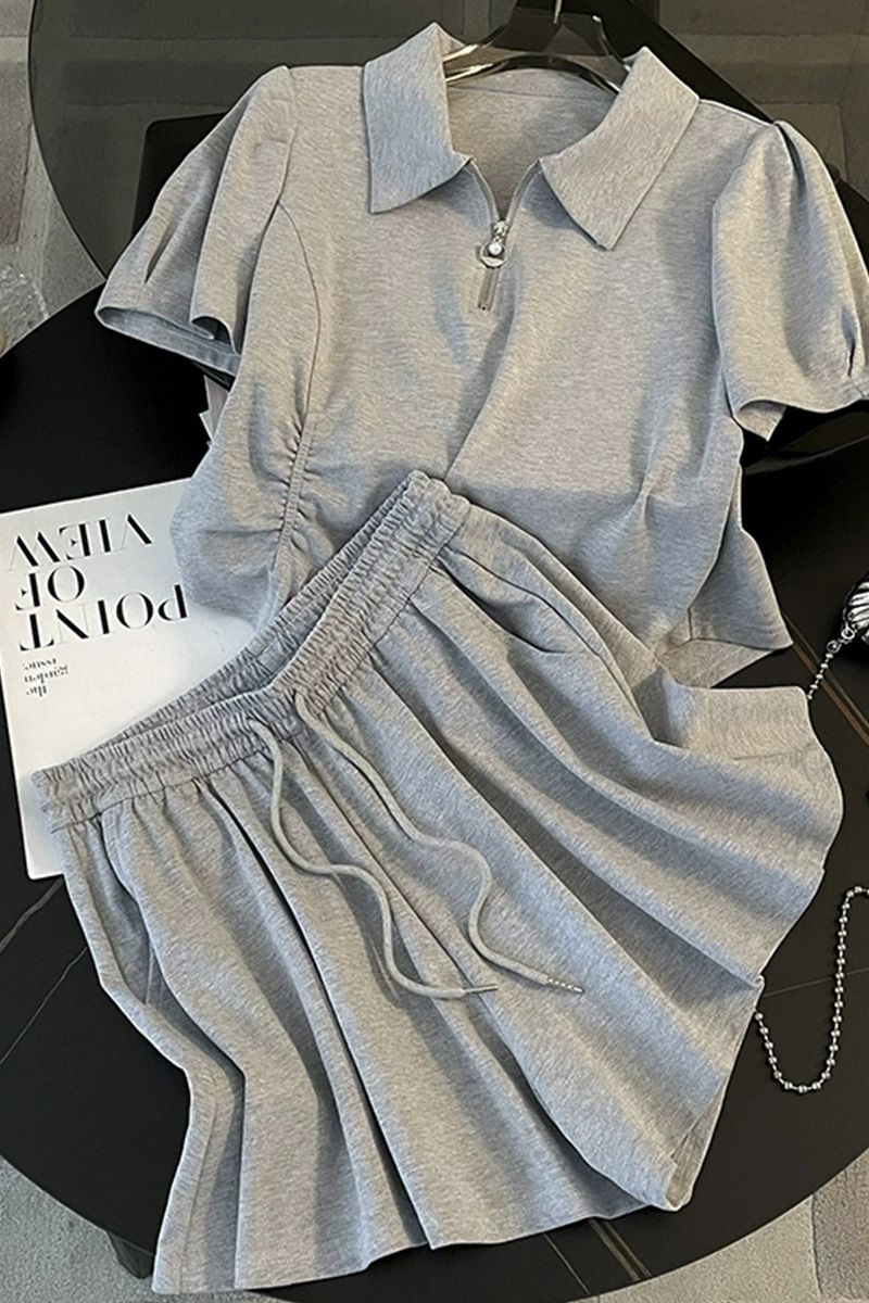 Vêtements pour femmes gris décontracté sport manches courtes costume pour femmes été mode Net célébrité rue ludique et vivant jambe large shorts deux pièces costume_voghion.com