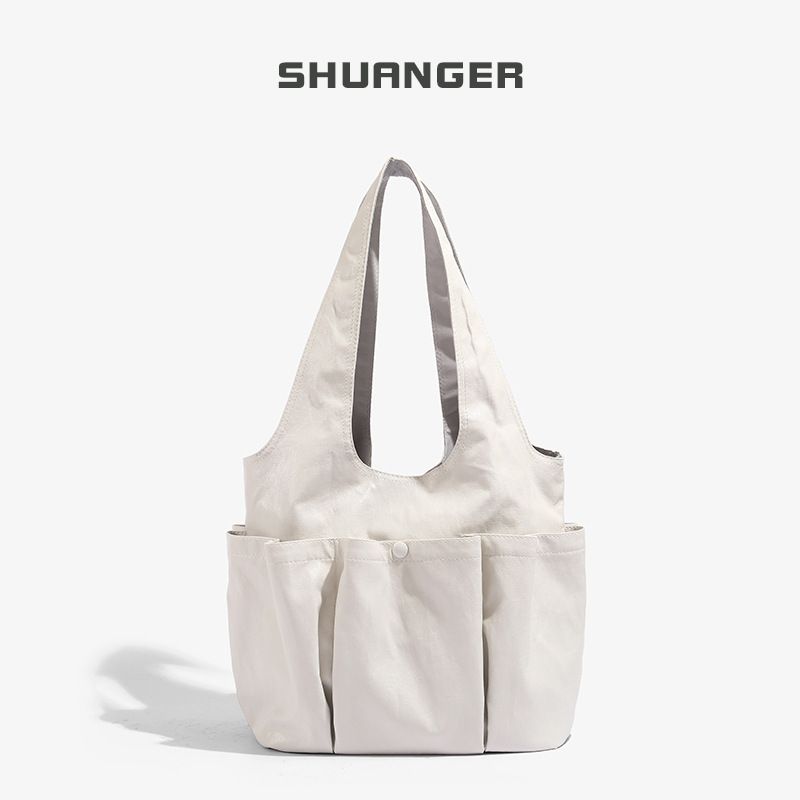Koreanische Nischen-Schulter- und Unterarmtasche mit mehreren Taschen, große Kapazität, Pendler-Einkaufstasche, Handtasche für Damen_voghion.com