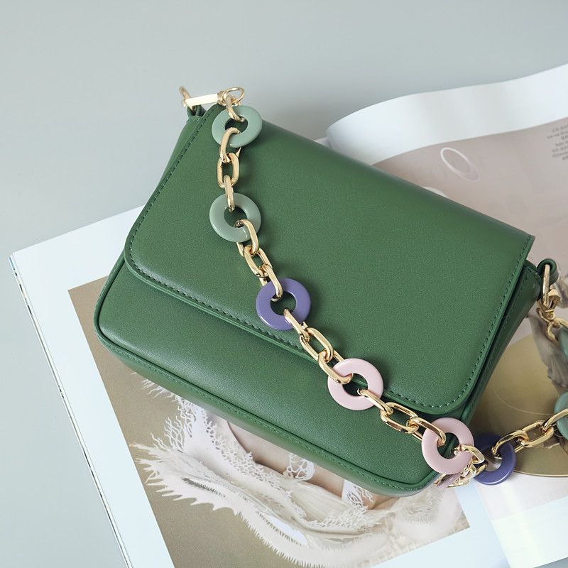Borsa da donna in resina acrilica colorata, rotonda, fatta a mano, con decorazione in metallo staccabile e tracolla a catena_voghion.com