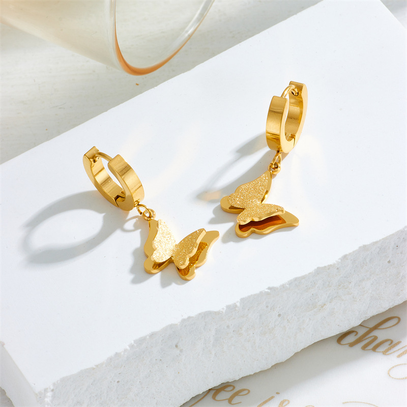 European and American niche fashion simple gold-plated retro butterfly pendant titanium steel versatile earrings_voghion.com