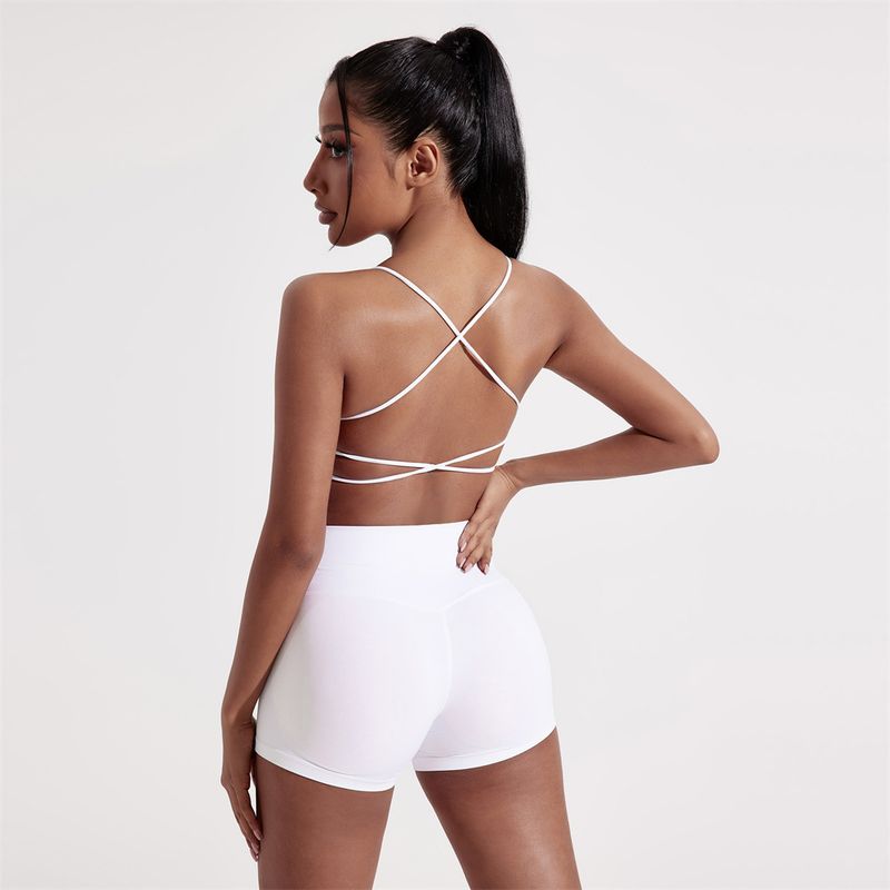 Summer Solid Color Yoga Set Two-Piece Sexy Back Cross Sports Bra + Barely There Tight-Fitting Three-Quarter Shorts_voghion.com