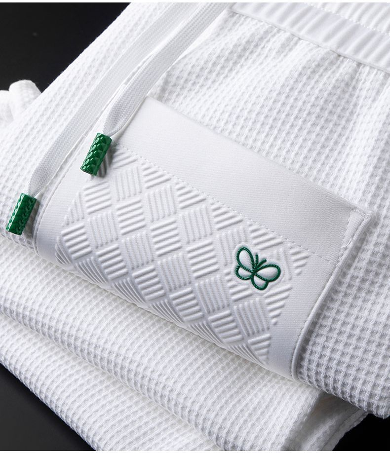 Pantaloni bianchi a quadri waffle leggeri di lusso alla moda europea per uomo, vestibilità slim e casual morbidi, primavera e autunno_voghion.com