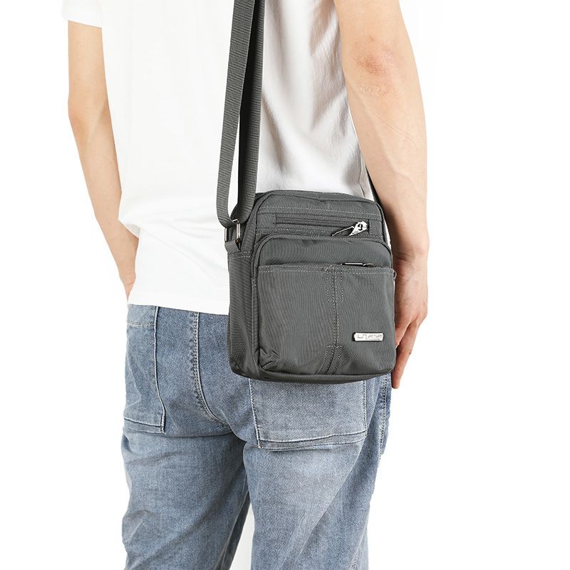 2025 Spring And Summer New Trend Men's Mini Bag Waterproof Nylon Oxford Canvas Shoulder Crossbody Casual Backpack Versatile_voghion.com