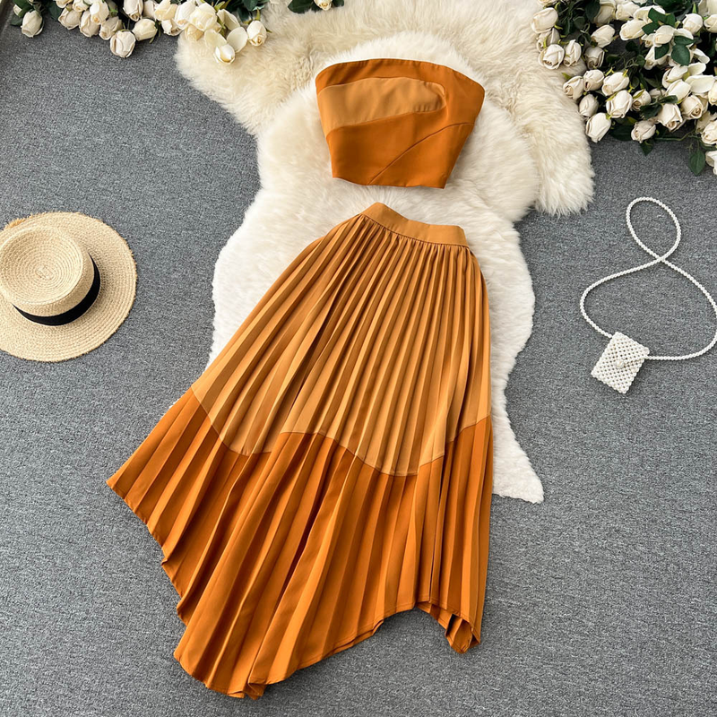 Abito da donna in due pezzi per gonna a pieghe irregolare con top a tubino in colore a contrasto stile estivo_voghion.com