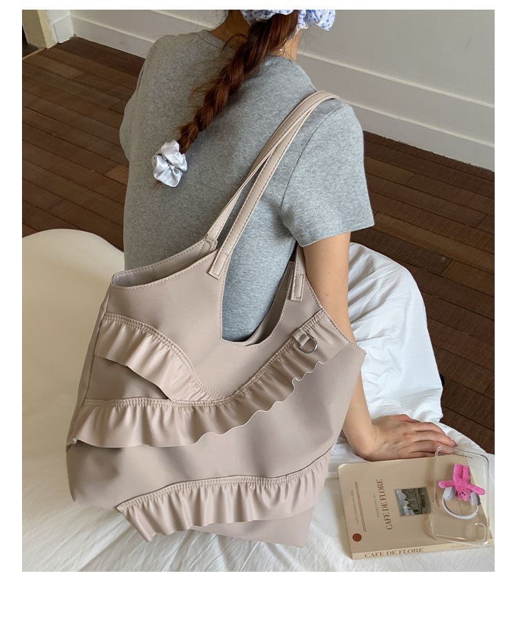 Borse alla moda di quest'anno 2025 Nuova versione coreana Moda Foglia di loto Versatile Spalla Donna Grande capacità Portatile_voghion.com