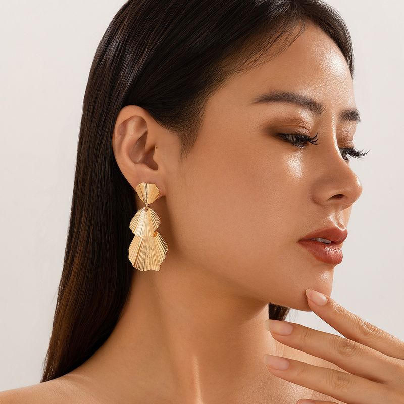 Personality metal geometric texture hollow earrings female irregular twisted glossy earrings earrings_voghion.com
