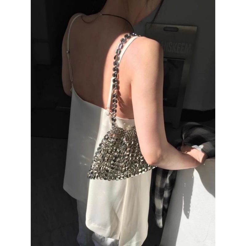 Spring And Summer New Niche Hollow Metal Beaded Silver Hand Weaving Shoulder Armpit Vacation Style Bag Fashion Versatile Casual Daily Simple_voghion.com