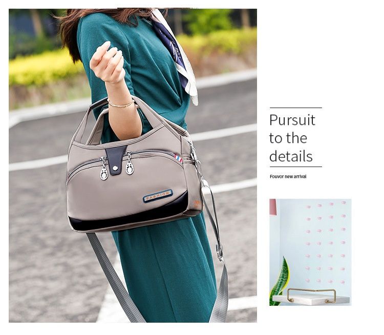 Modern och lätt Oxfordtyg Koreansk version Dam Casual Stor Kapacitet Vattentät Rese Shopping Handhållen Axelväska Crossbody_voghion.com