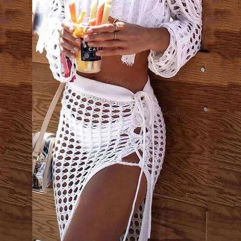 Gonna lunga da spiaggia per vacanze casual al mare, camicetta con spacco in nappa cava lavorata a maglia alla moda_voghion.com