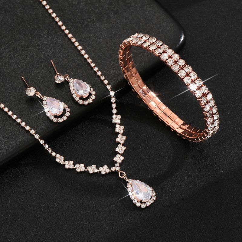 Set di gioielli da sposa con collana, orecchini e bracciale a goccia in zircone con diamanti pieni._voghion.com