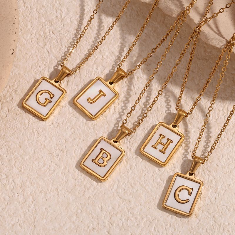 Collier minimaliste E.B.belle en acier inoxydable plaqué or avec initiales en nacre et coquillage, anti-ternissement, pour femme_voghion.com