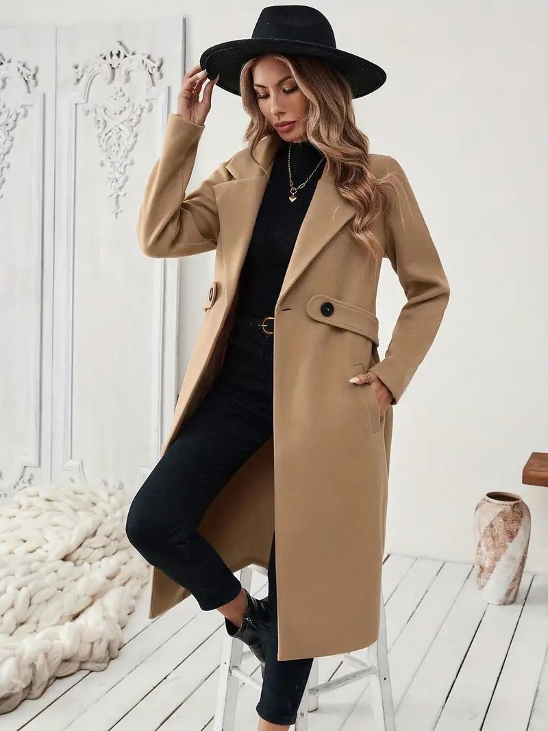 Elegante cappotto da donna in tweed nero e beige di media lunghezza, versatile dall'ufficio alla sera, con scollo a V e tasche._voghion.com
