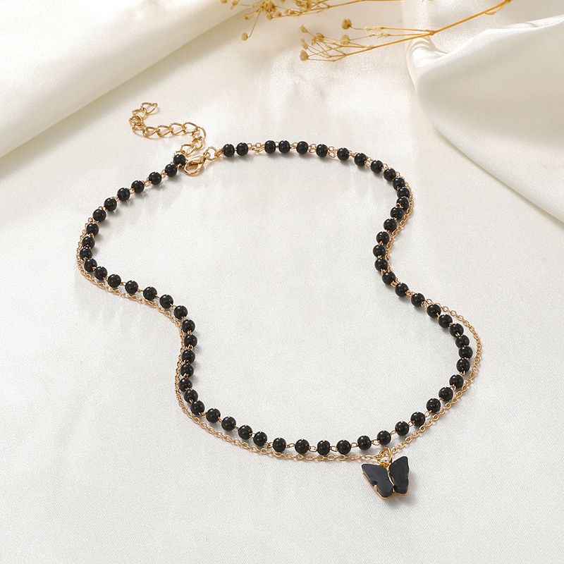 Collar con colgante de mariposa de doble capa, estilo gótico, diseño retro de nicho, cadena de clavícula con cuentas negras_voghion.com