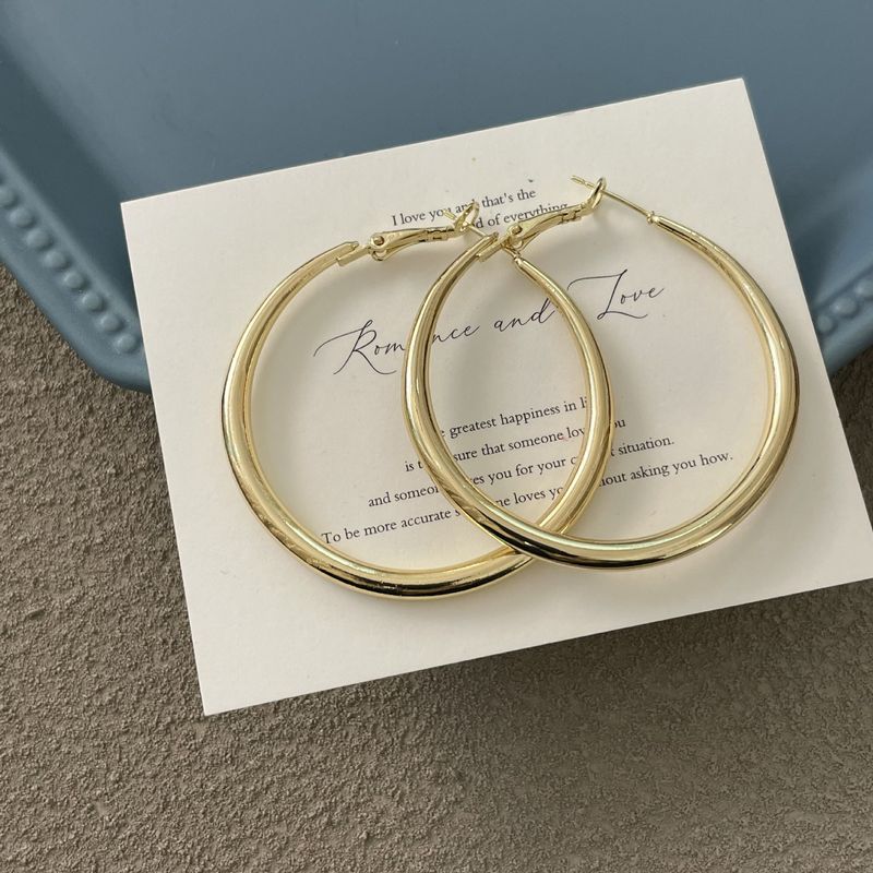 Orecchini a cerchio esagerati e spessi in metallo lucido argento per donna, nuovi orecchini a cerchio con design unico e alla moda._voghion.com