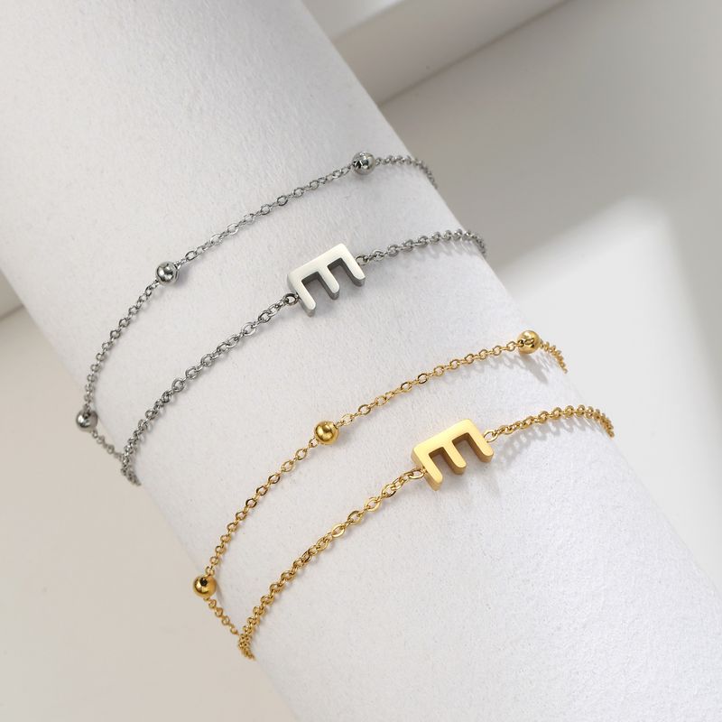 Pulsera de acero de titanio con corte dorado y doble cadena con colgante de 26 letras, pulsera de pareja de acero inoxidable_voghion.com