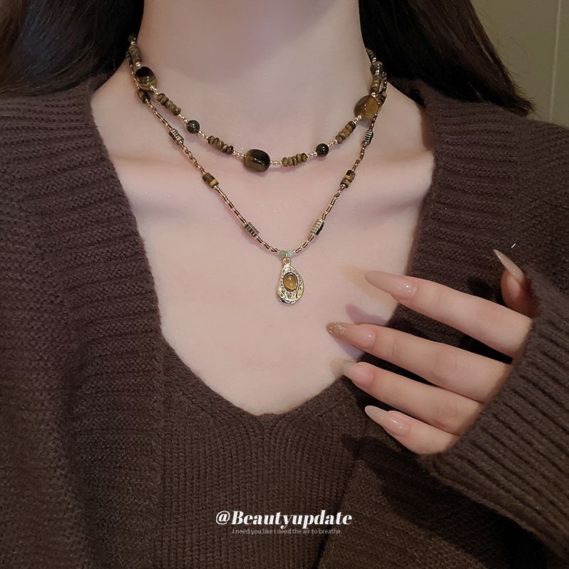 Milad Unregelmäßiger ovaler Tigerauge-Stein Einfache High-End-Pulloverkette Elegante Vielseitige Halskette Für Damen_voghion.com