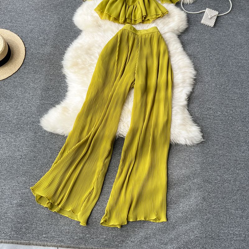 Vêtements pour femmes Costume de vacances pour femmes 2023 nouvelle chemise en mousseline de soie à bretelles à épaules dénudées à volants et pantalon large plissé drapé_voghion.com