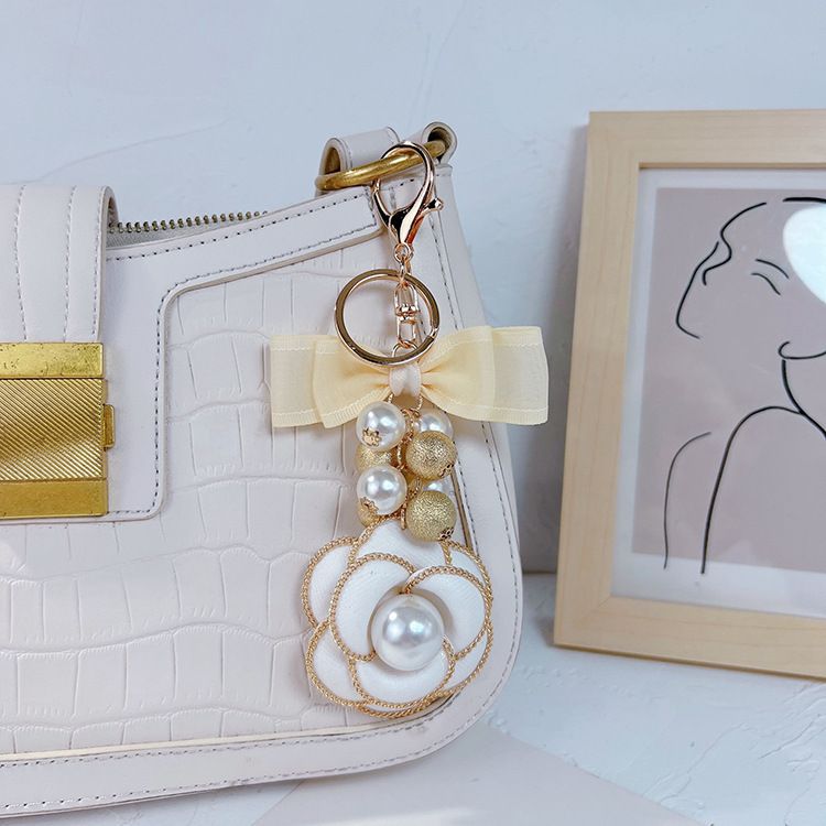 Chain pearl camellia bag pendant fashionable women's double-layer bow creative keychain goods_voghion.com