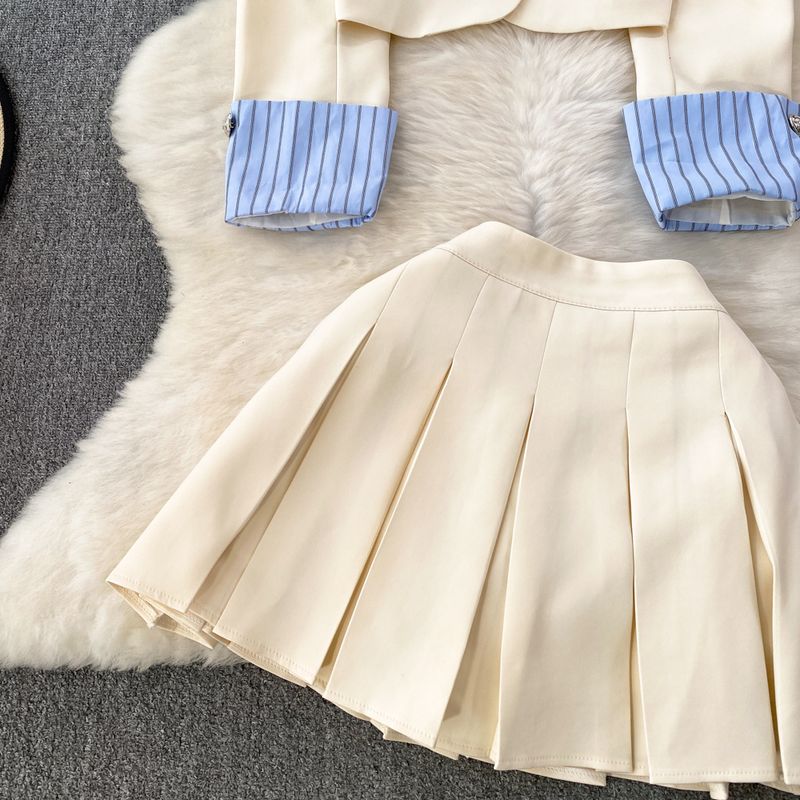 Damenbekleidung Modischer Anzug für Damen, damenhaftes Temperament, gestreifte Anzugjacke mit Spleiß, zweiteiliger Anzug, A-Linien-Rock mit hoher Taille_voghion.com