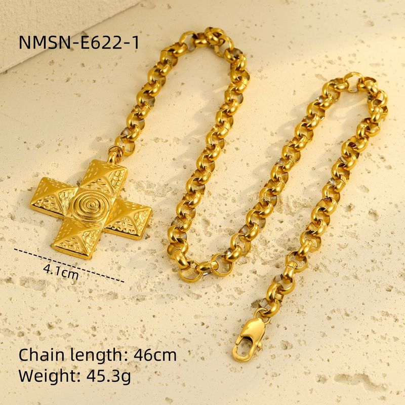 Collier INS polyvalent haut de gamme en acier inoxydable, métal titane, texture spirale et croix. Bijou_voghion.com