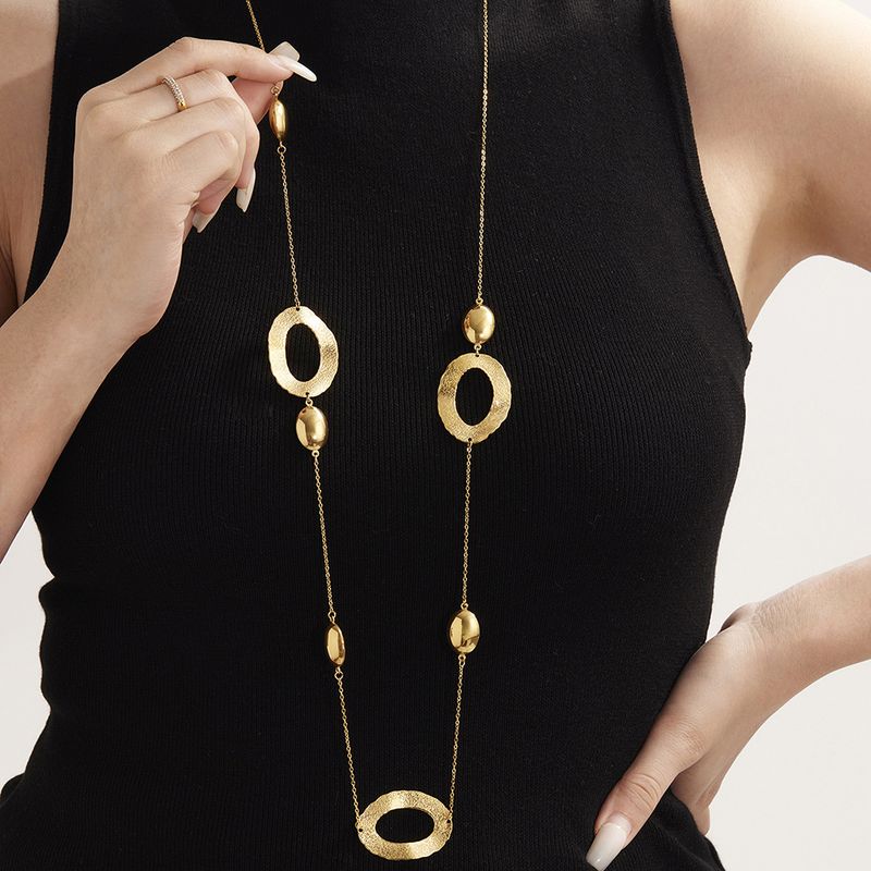 Sugar Cube Hammer Pattern Ring Light Hollow Polished Egg Shaped Long Sweater Chain Niche Design Titanium Steel Clavicle Chain Jewelry_voghion.com