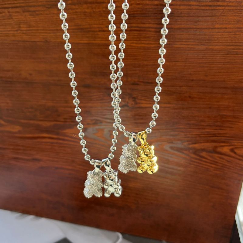 Collana con ciondolo a forma di orso con zircone intarsiato micro in titanio, design di nicchia, moda, collana versatile, catena per maglione_voghion.com