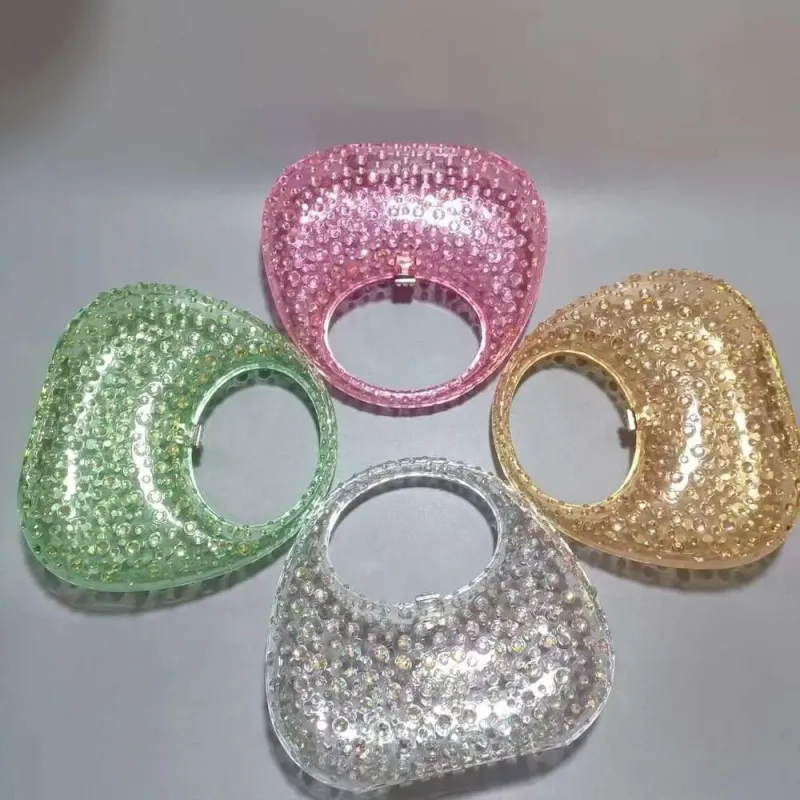 Borsa da sera da donna in acrilico trasparente lucido con motivo a mezzaluna tempestato di diamanti e strass_voghion.com