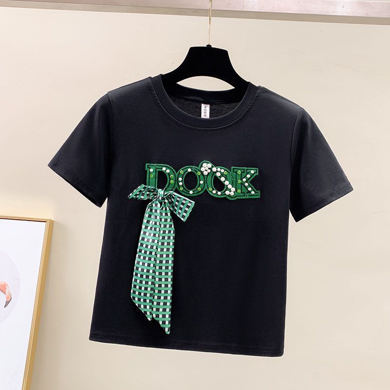 Roupas femininas nova camiseta de manga curta com laço frisado e saia jeans com borda crua dividida_voghion.com