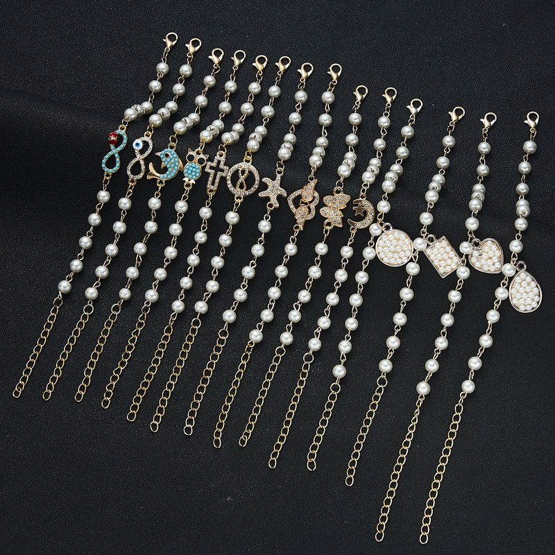 Bracelet créatif en forme de 8 avec perles creuses et strass pour femme_voghion.com