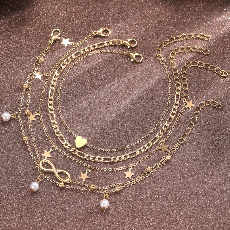 hete verkoop parel strand enkelband vijfpuntige ster vlinder hanger geluk 8 karakter multi-layer enkelband set 4 stuks_voghion.com