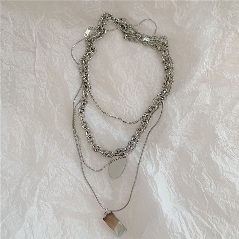 Collana in acciaio al titanio con catena per clavicola a più strati, con ciondolo a forma di marchio Garden, da donna_voghion.com