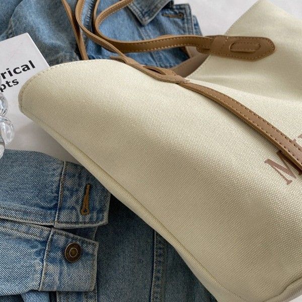 Canvas Large Women 2025 Spring New High-end Fabric Handheld Shoulder Bag For Class And Commute Tote_voghion.com