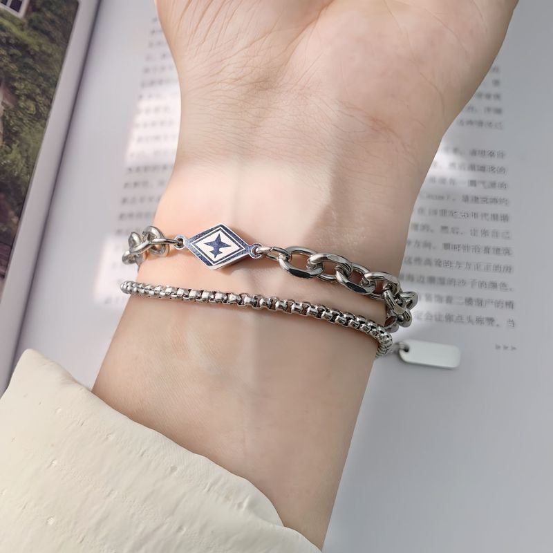 Bracciale da uomo cubano in acciaio al titanio leggero e lussuoso, a forma di diamante, 2025, design semplice e versatile, per coppie, da donna_voghion.com
