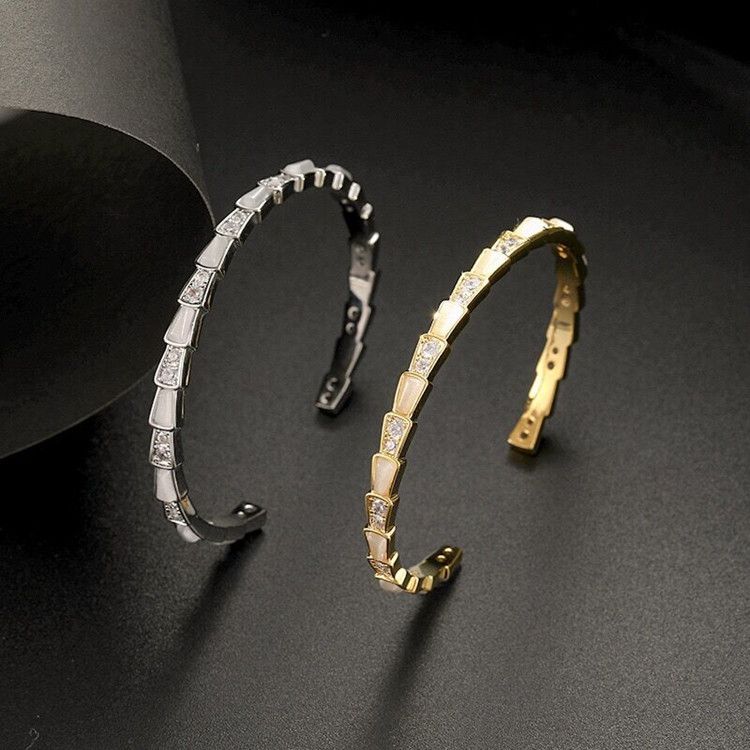 Un design de nișă cu o brățară cu textură de diamant strălucitoare cu deschidere în formă de șarpe de piatră de ochi de pisică de ultimă generație, ușoară pentru femei_voghion.com