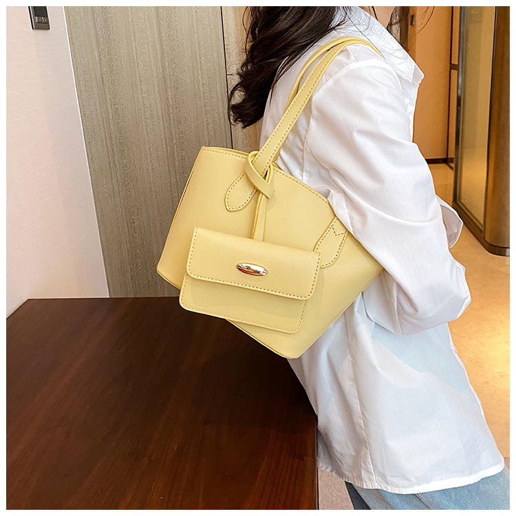 Borsa piccola portatile di moda estiva nuova borsa a secchiello casual semplice da donna 2023 borsa per ascelle suocera con trama di nicchia_voghion.com